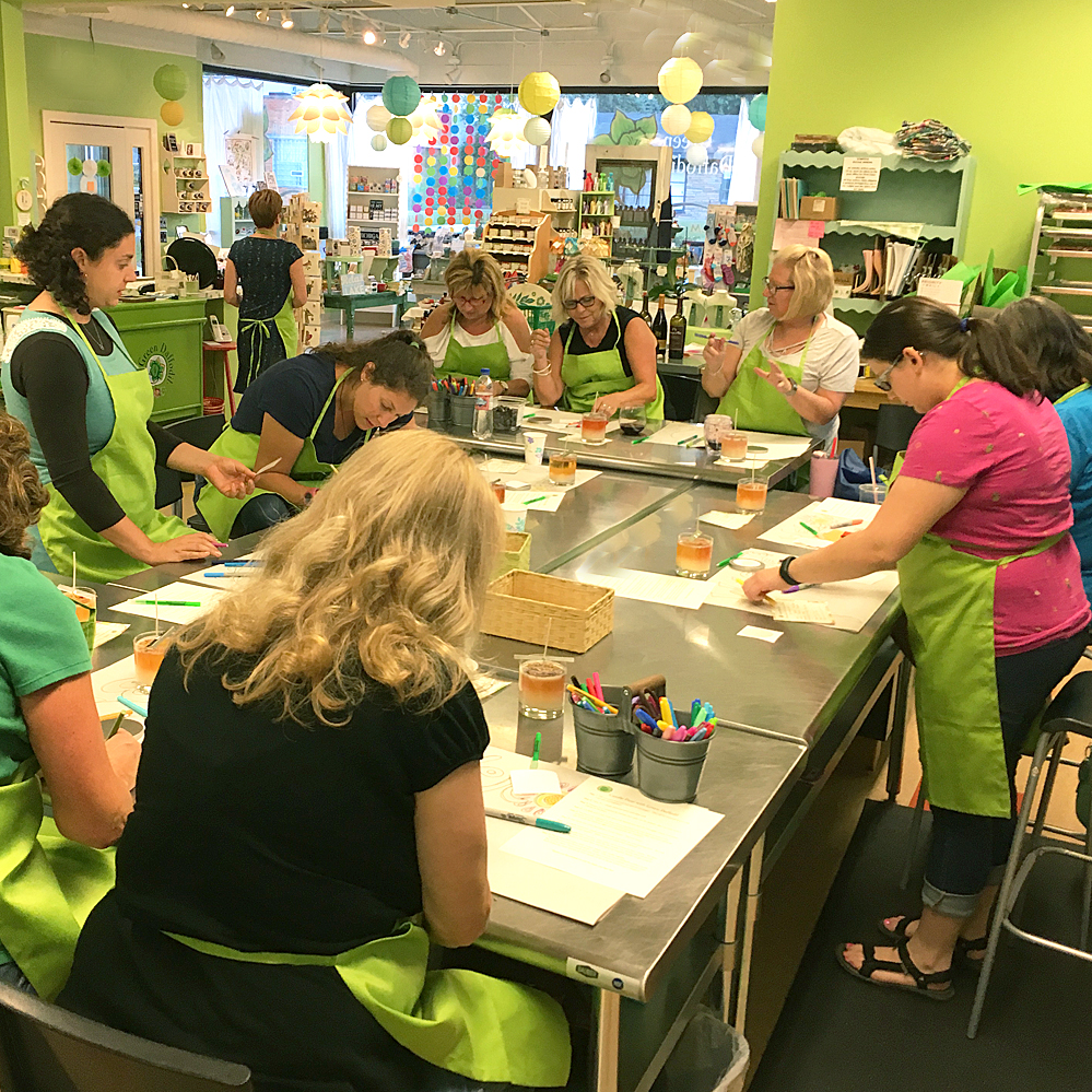 Party-goers making candles.